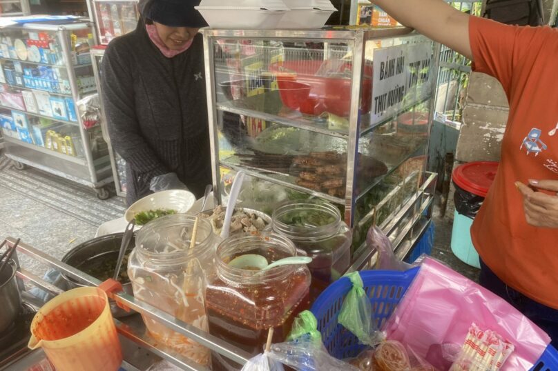 A local Vendor Selling street food in Ho Chi Minh City.